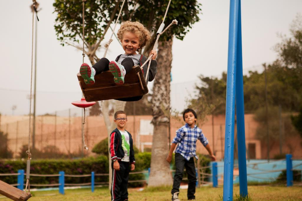 Tui Suneo Kenzi Europa Agadir Exterior photo Children playing on a swing